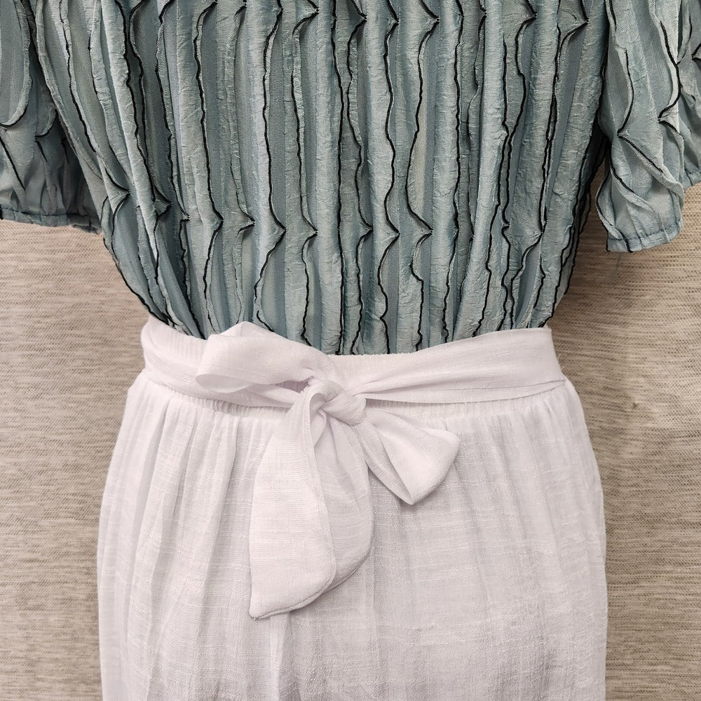 Bow tie at back of white skirt