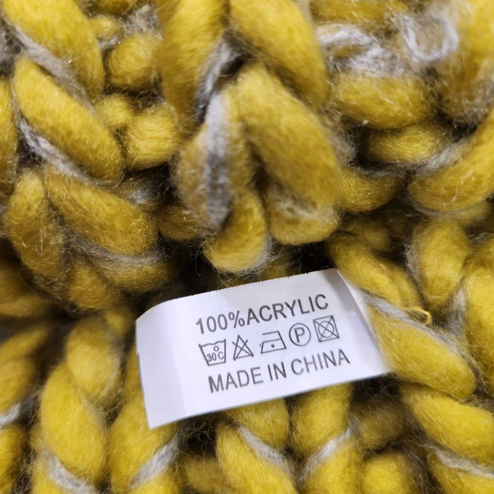 Inside tag on yellow grey winter beanie