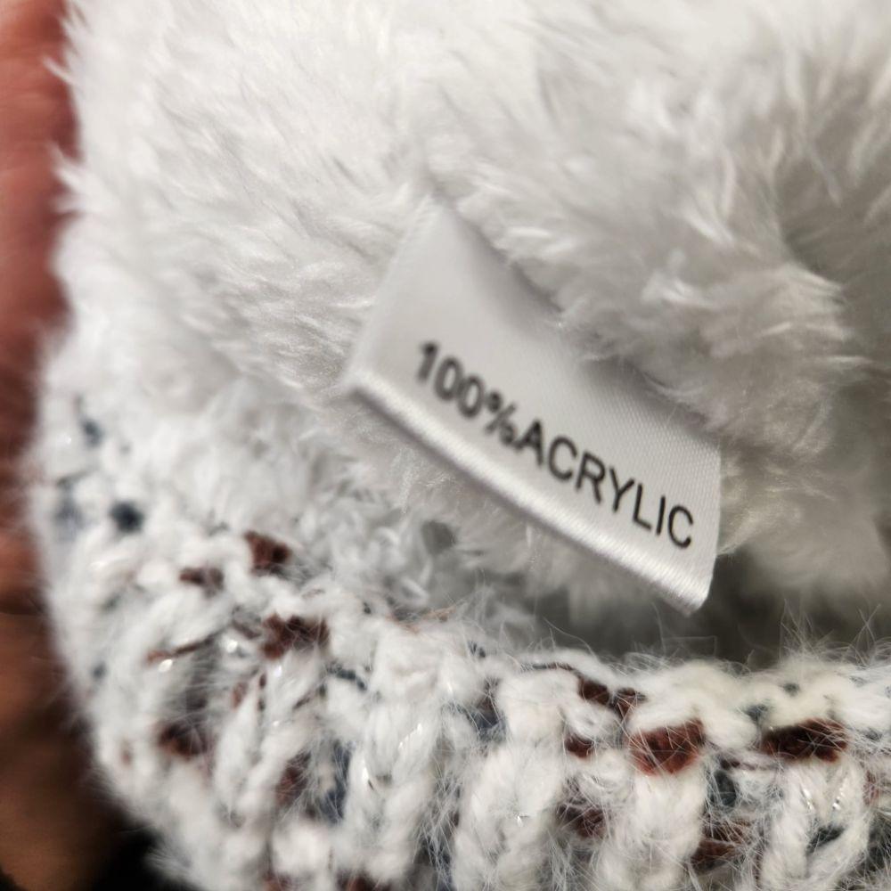 Tag on inside of the infinity scarf