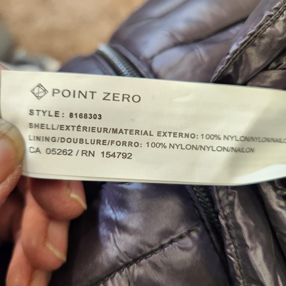 Inside tag of black ultra light fall jacket