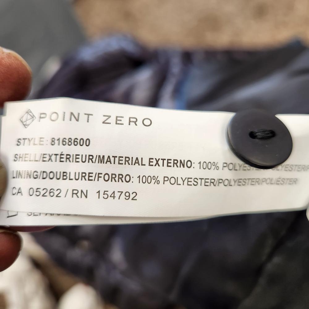 Inside tag on navy winter puffer jacket