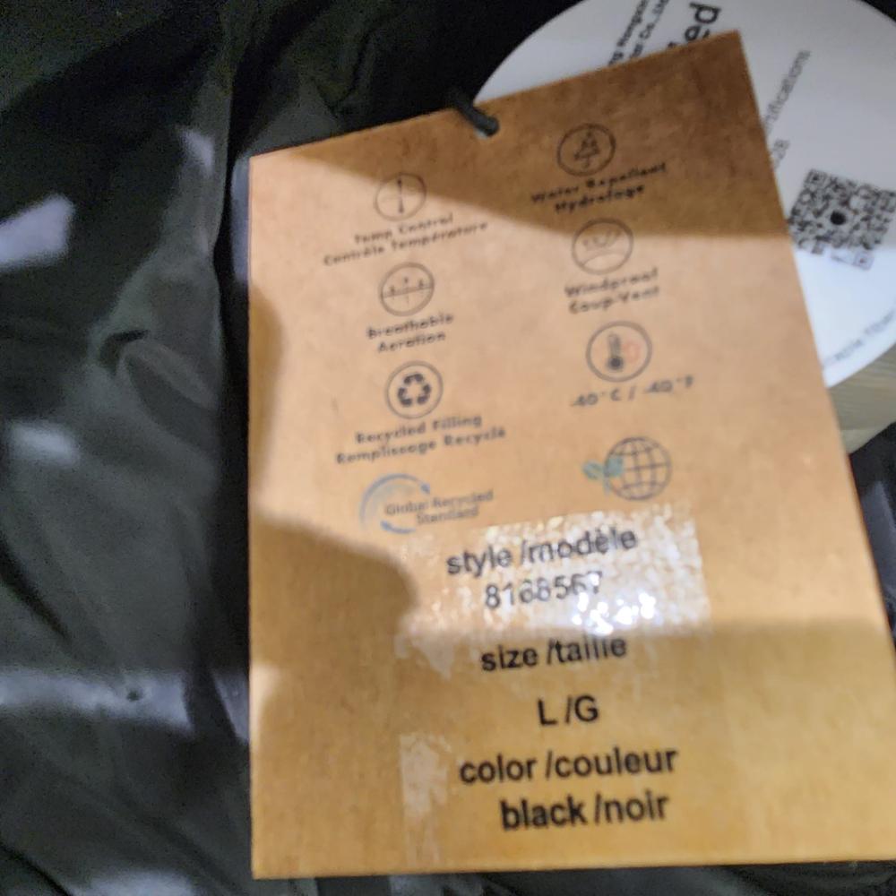 Tag 2 on long black puffer jacket