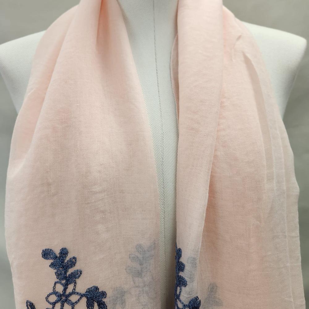 Detailed top section view of Light peach summer scarf