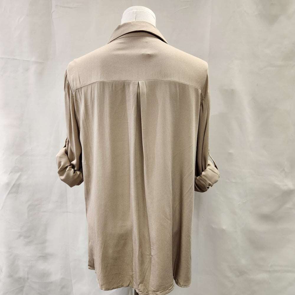 Rear view of beige dress shirt