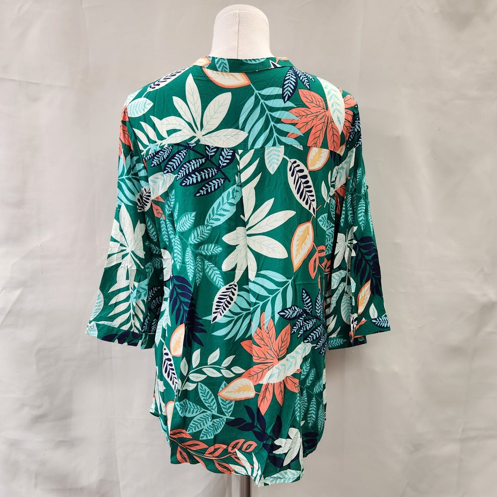 Rear view of green summery print shirt for women
