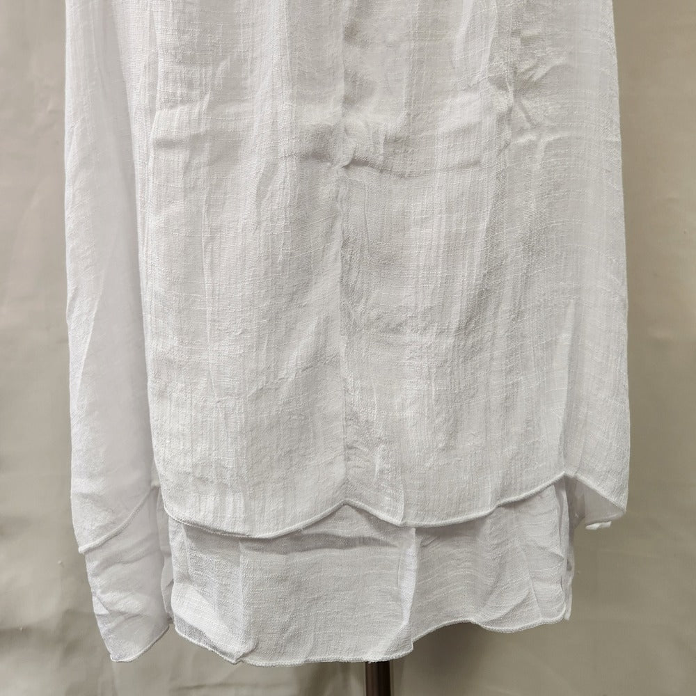Layered bottom of white casual summer top