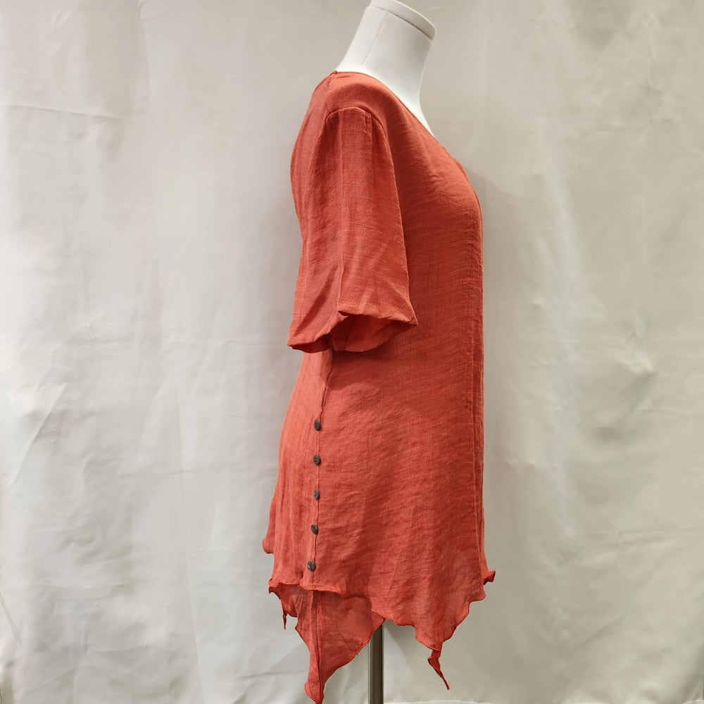 Side view of Short sleeve red layered top with pleated necknline