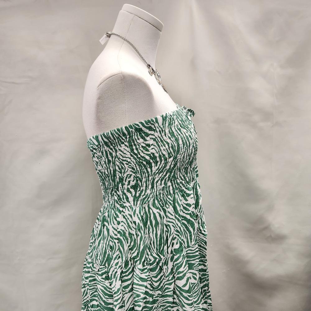 Side view of Zebra print green and white shoulder less top