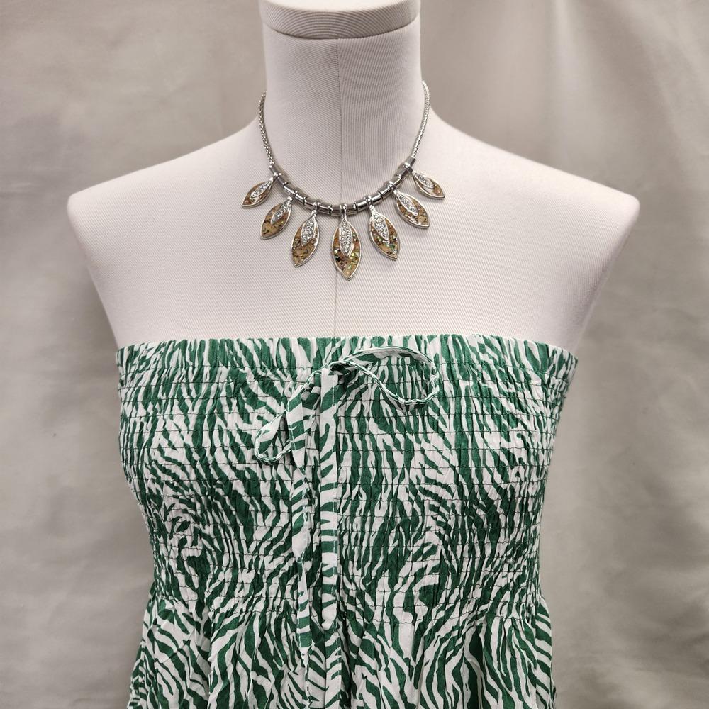 Smocked upper of Zebra print green and white shoulder less top