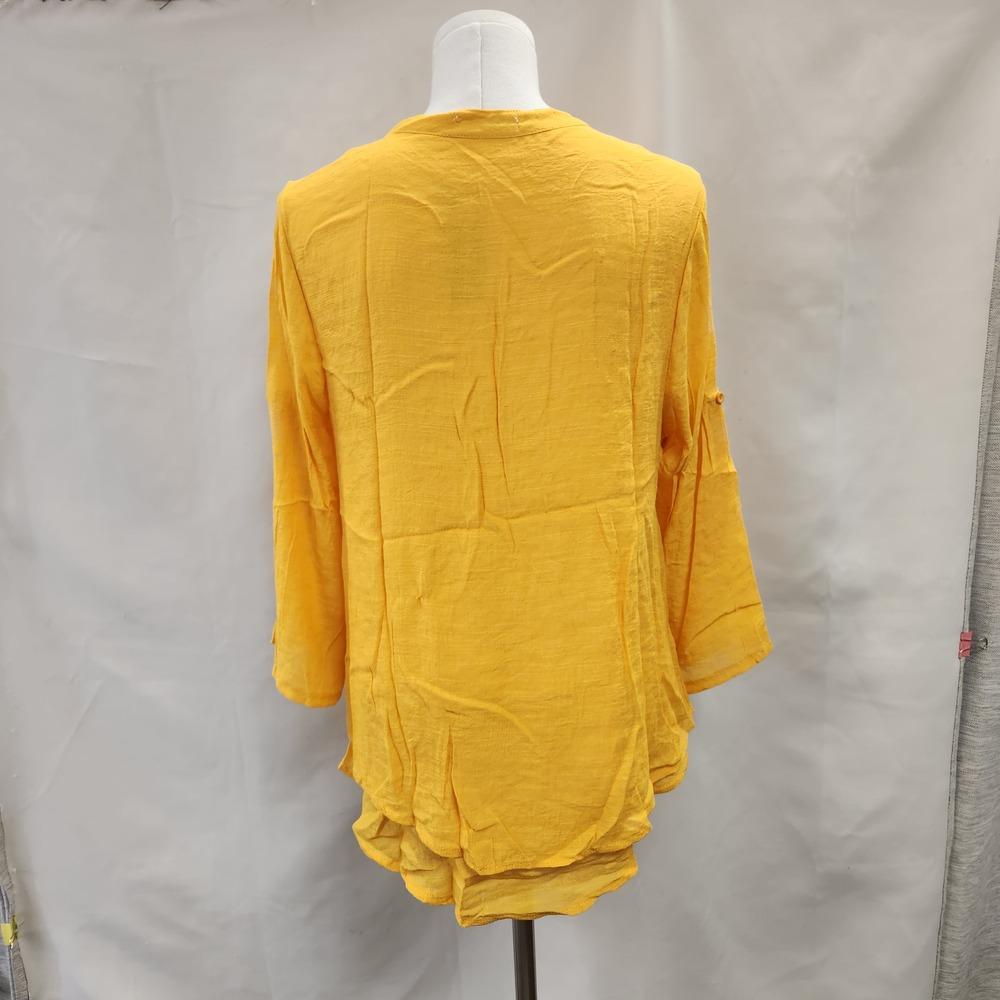 Rear view of Layered yellow summer top with roll up sleeves