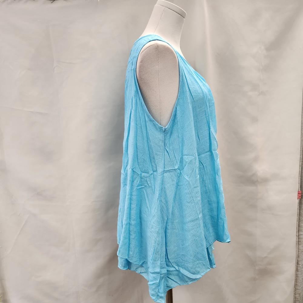 Side view of Light turquoise layered sleeveless summer top