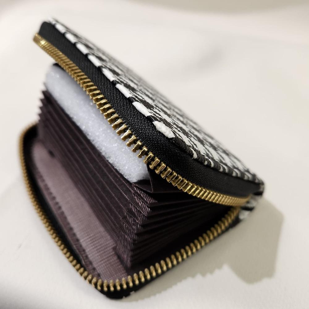 Black and white houndstooth pattern card holder when opened