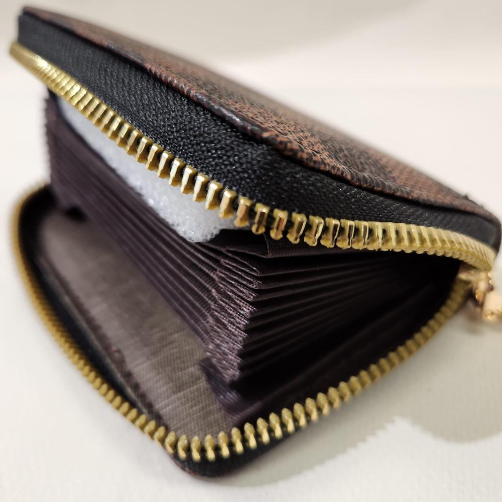 Brown checkered print card holder when opened