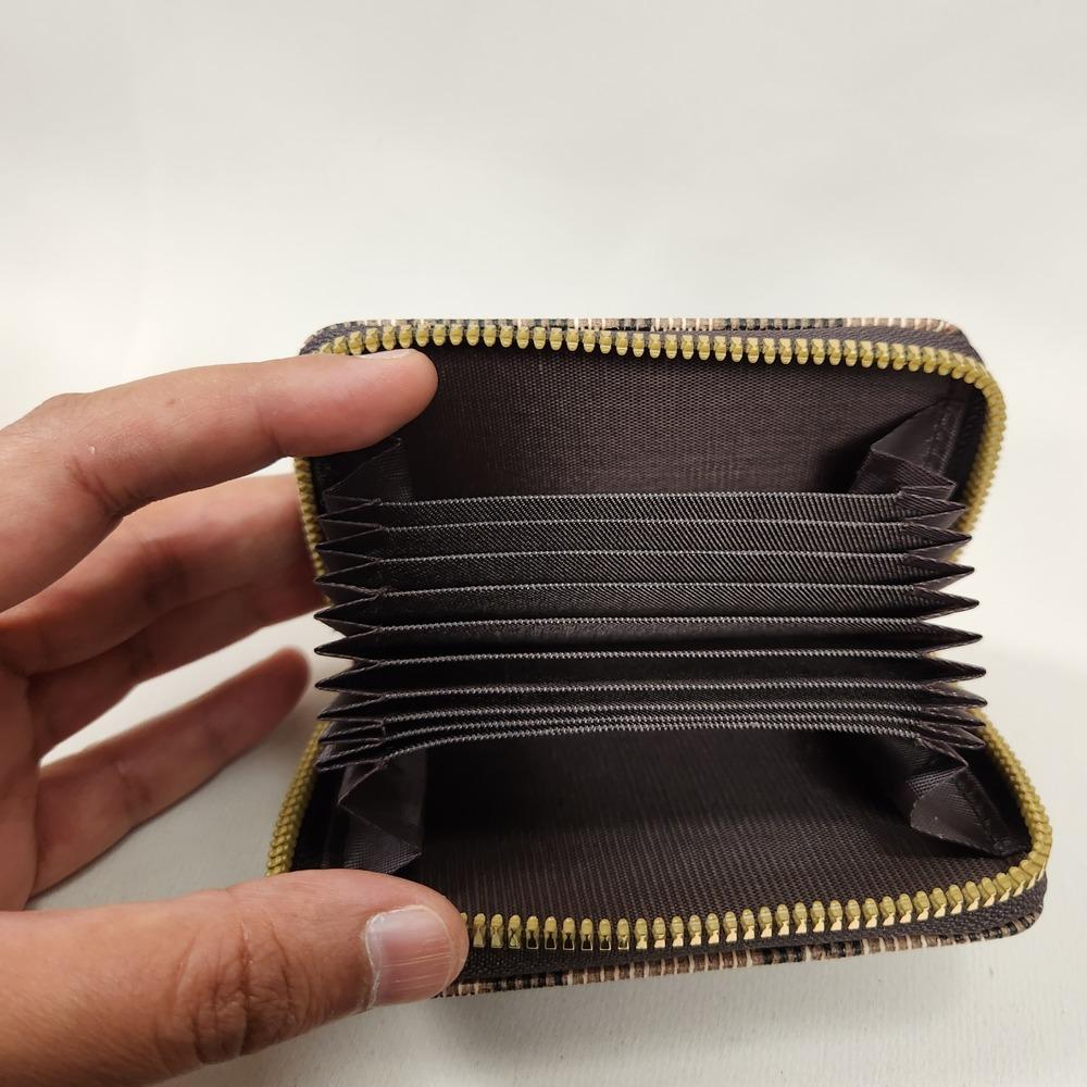 Animal print card holder in shades of brown when opened
