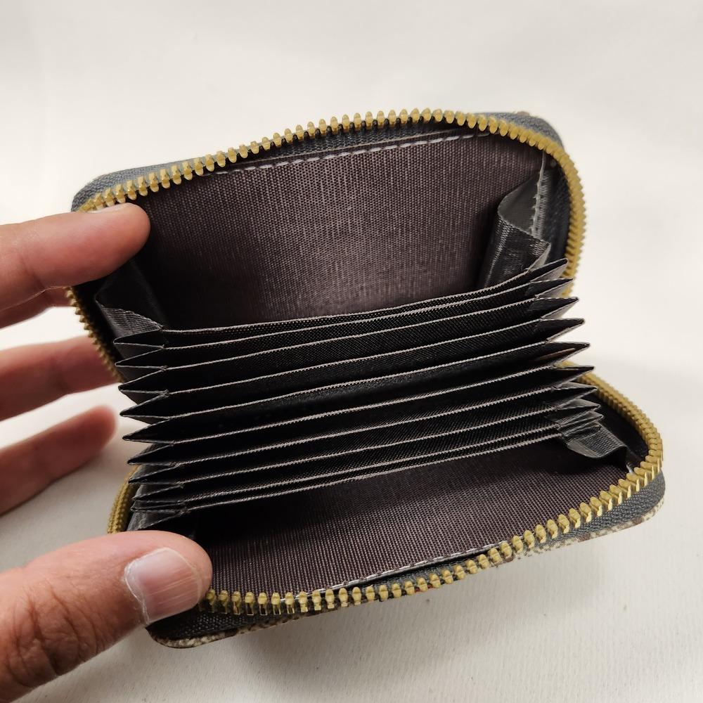 Signature print card holder with zip closure when opened