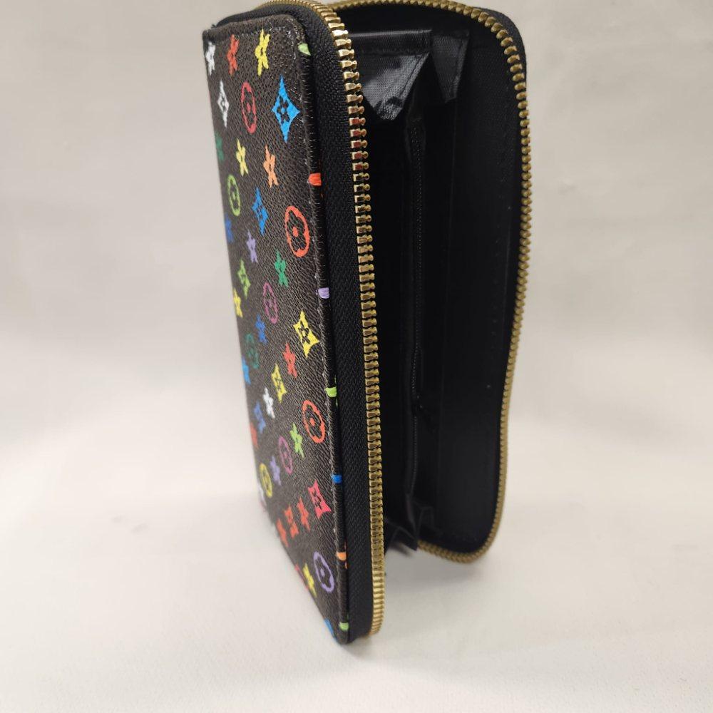 Brown wallet with multicolored floral pattern when opened