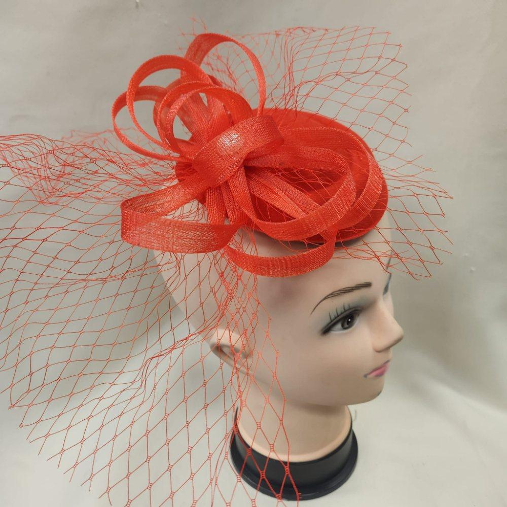 Elegant red cambric base fascinator with veil and pearl embellishment