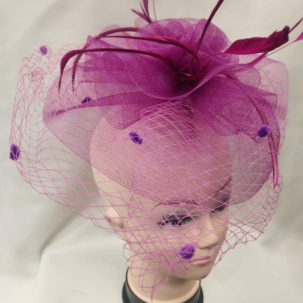 Side view of Classic magenta fascinator with veil