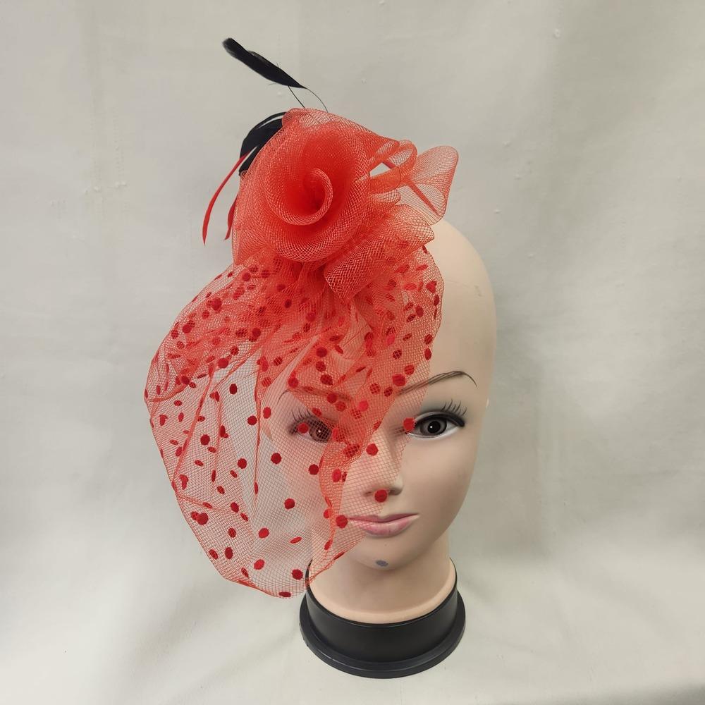 Another front view of Red fascinator with mesh and feather detail