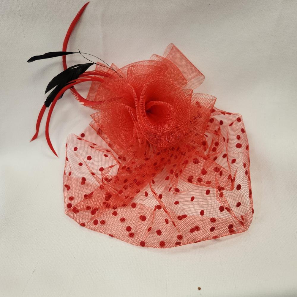 Red fascinator with red and black feathers