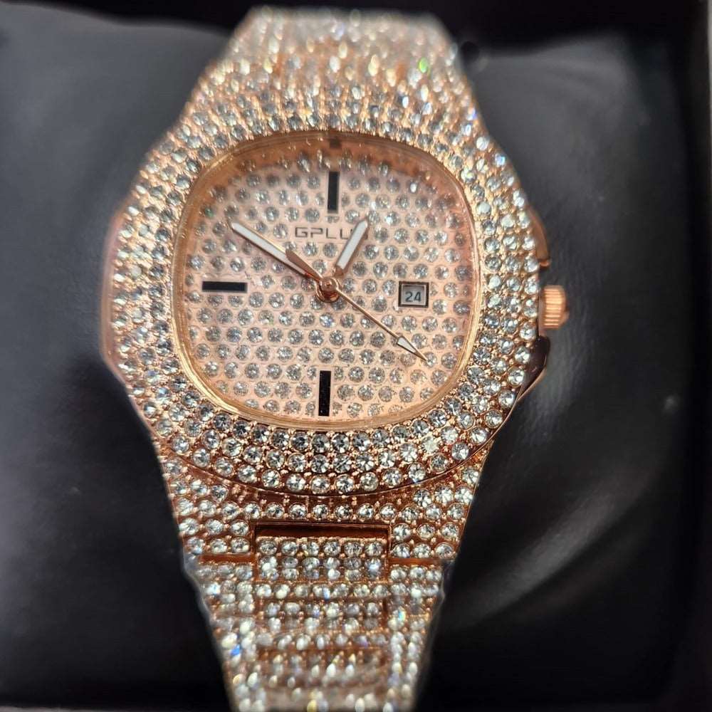 Detailed view of wrist watch in rose gold with stone embellished strap and dial
