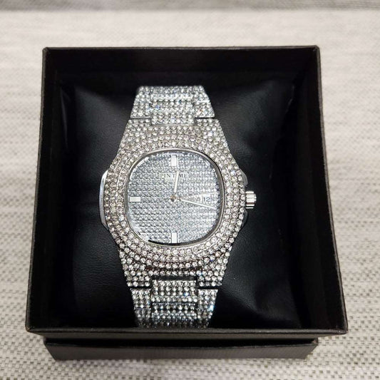 Wrist watch in silver with stone embellished strap and dial