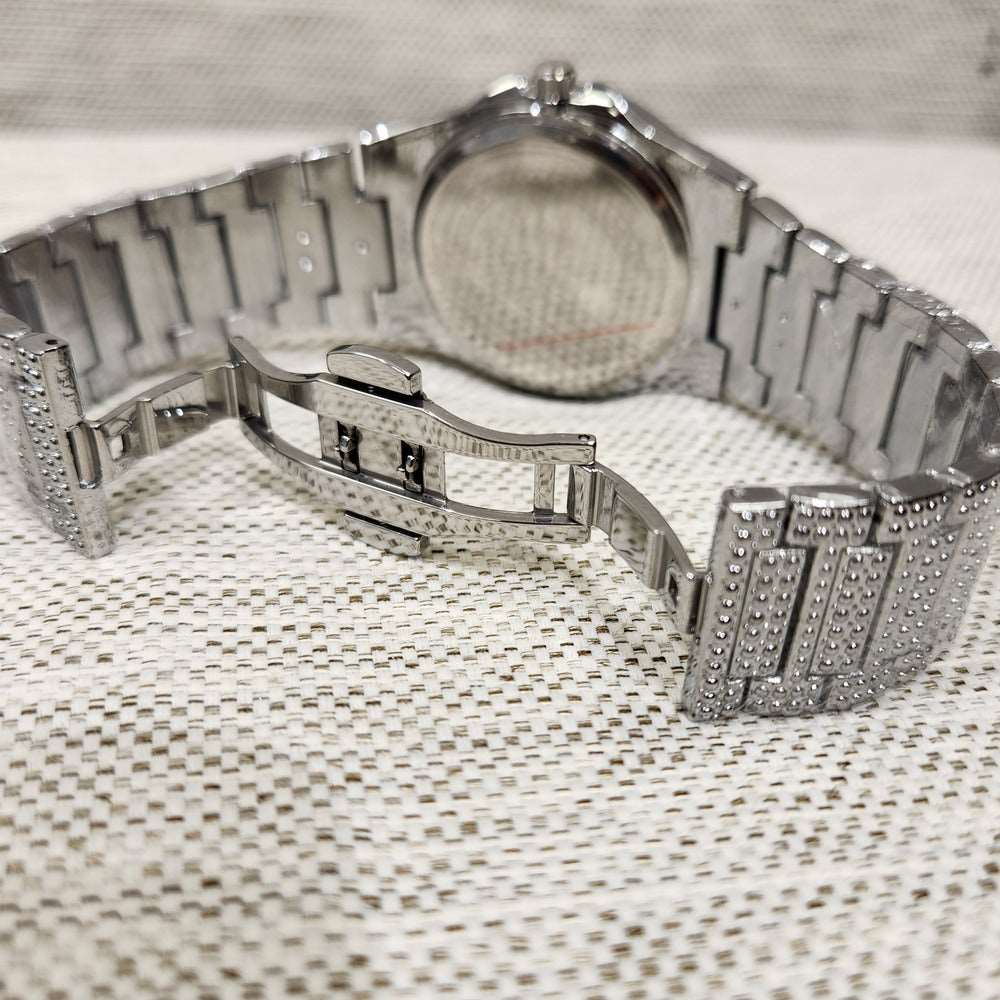 Butterfly clasp of silver color wrist watch when opened