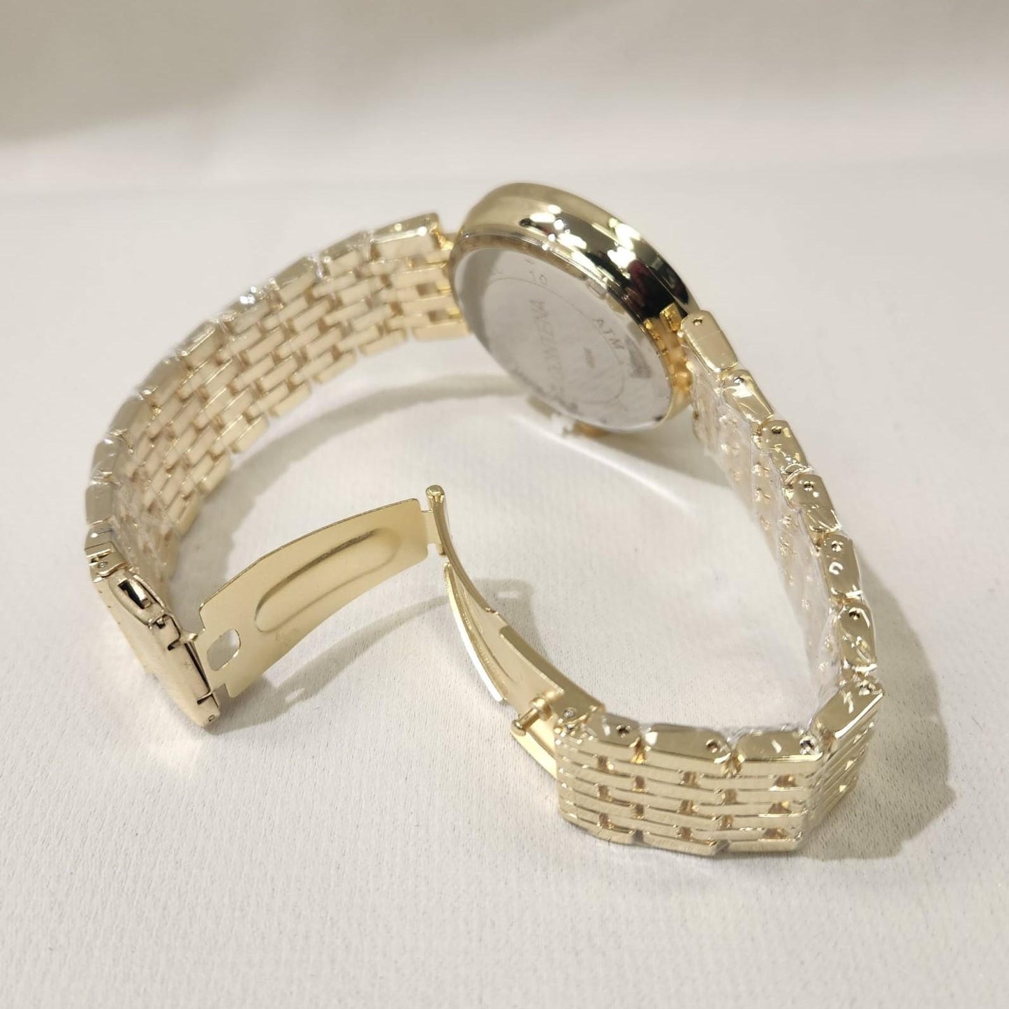 Another view of folding clasp of gold wristwatch for women