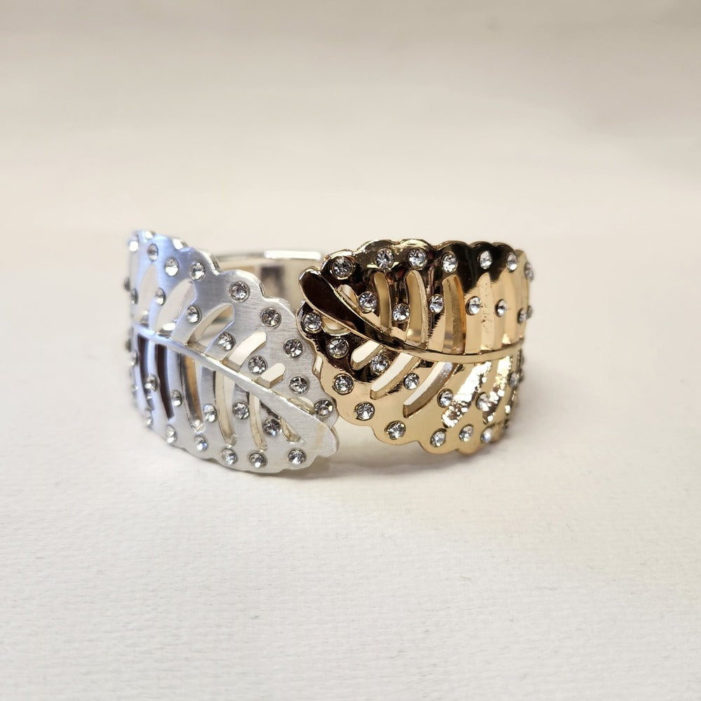 Detailed view of Leaf shaped dual tone hinged bracelet