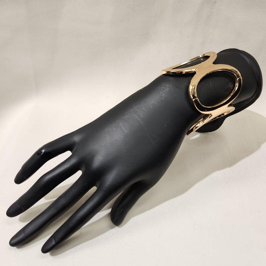 Trendy gold hinged bracelet