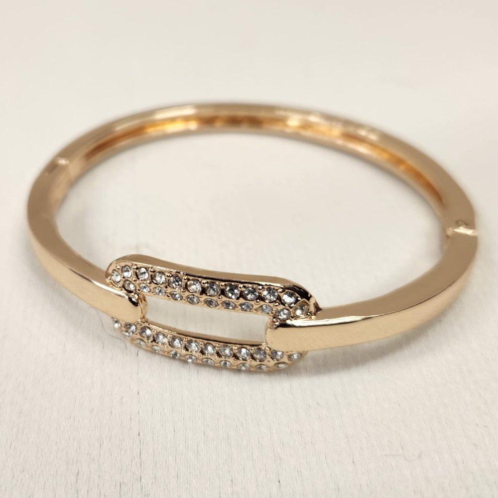 Detailed view of Gold bracelet with clear stones