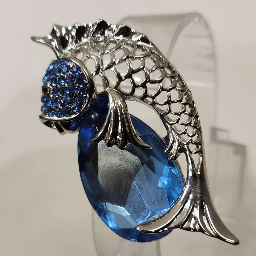 Another view of Elegant fish shaped brooch in silver frame