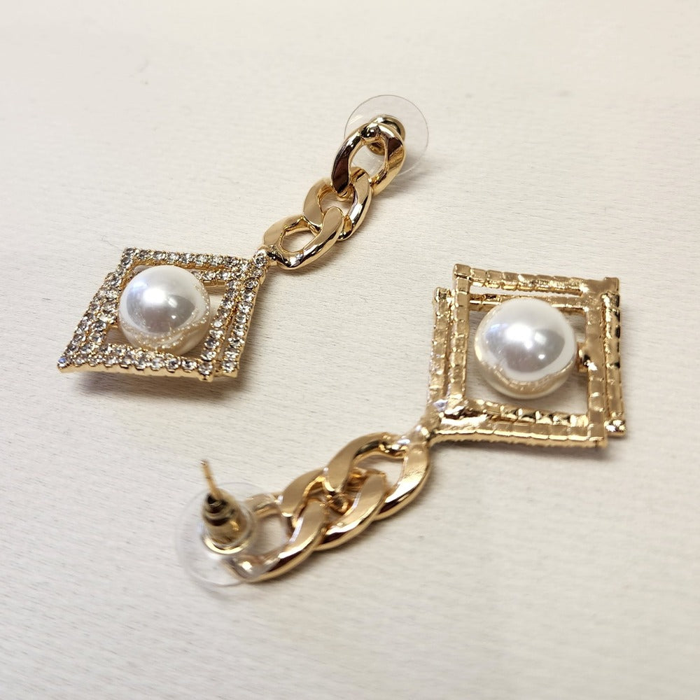 Push back post of Gold frame dangle earrings with pearl and stone setting