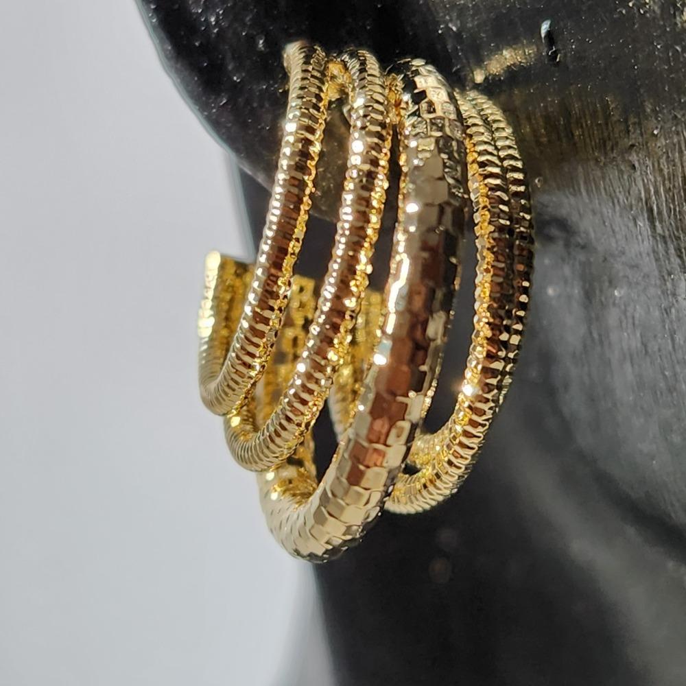 Another view of gold color open loop earrings