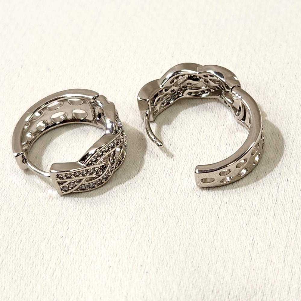 Latch back post of silver braided hoop earrings