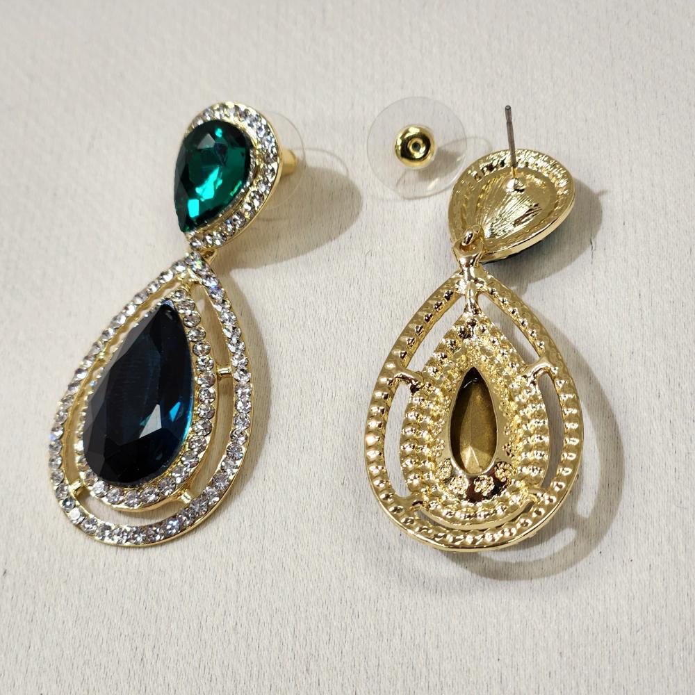 Pushback post of dangle earrings with clear and green stones
