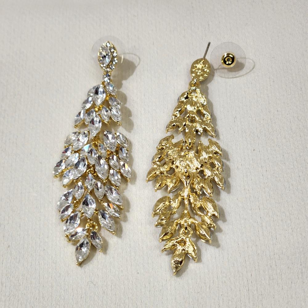 Pushback post of Gold frame dangle earrings with clear stones