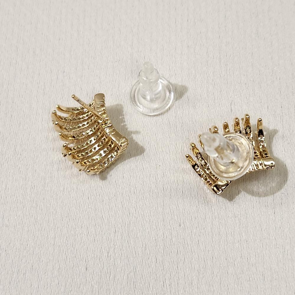 Push back post of gold stud earrings with stones