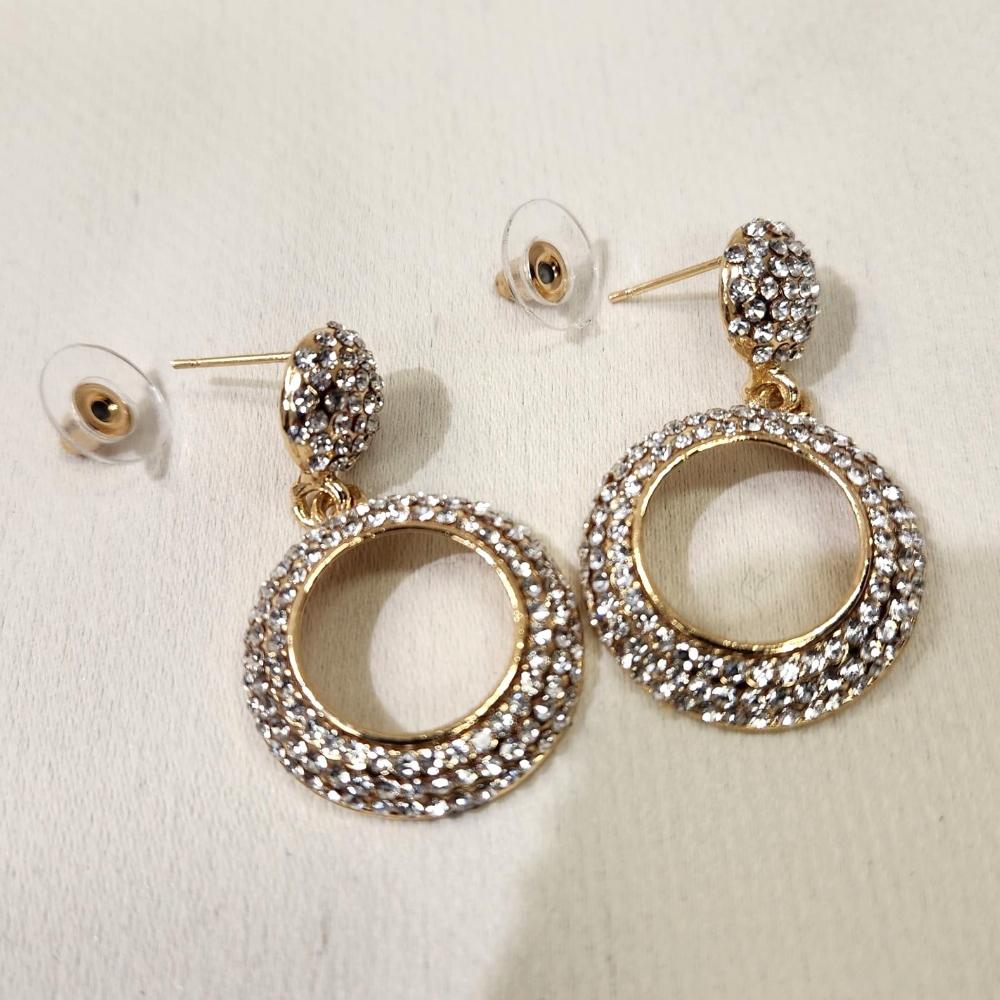 Push back post of Gold hued stone studded bold dangle earrings