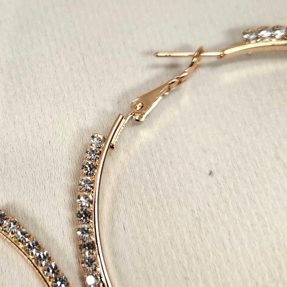 Lever back closure of large hoop earrings