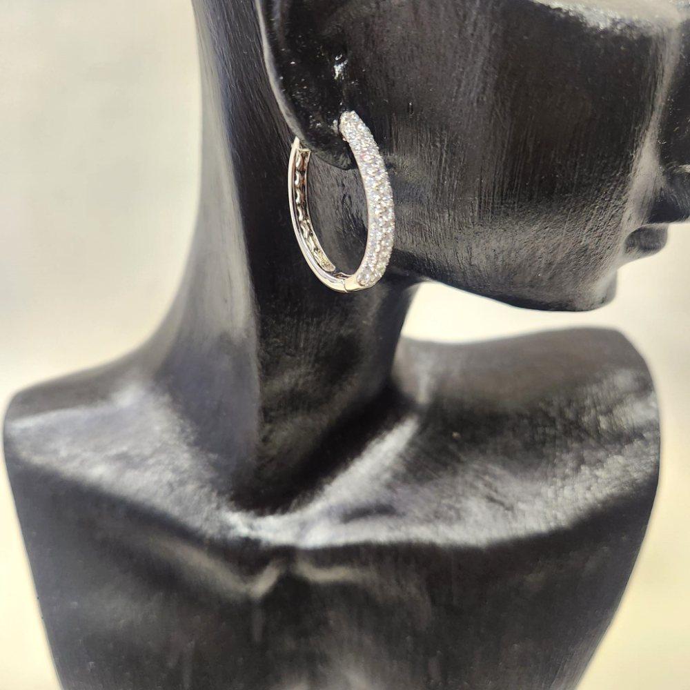 Detailed view of mid sized hoop earrings