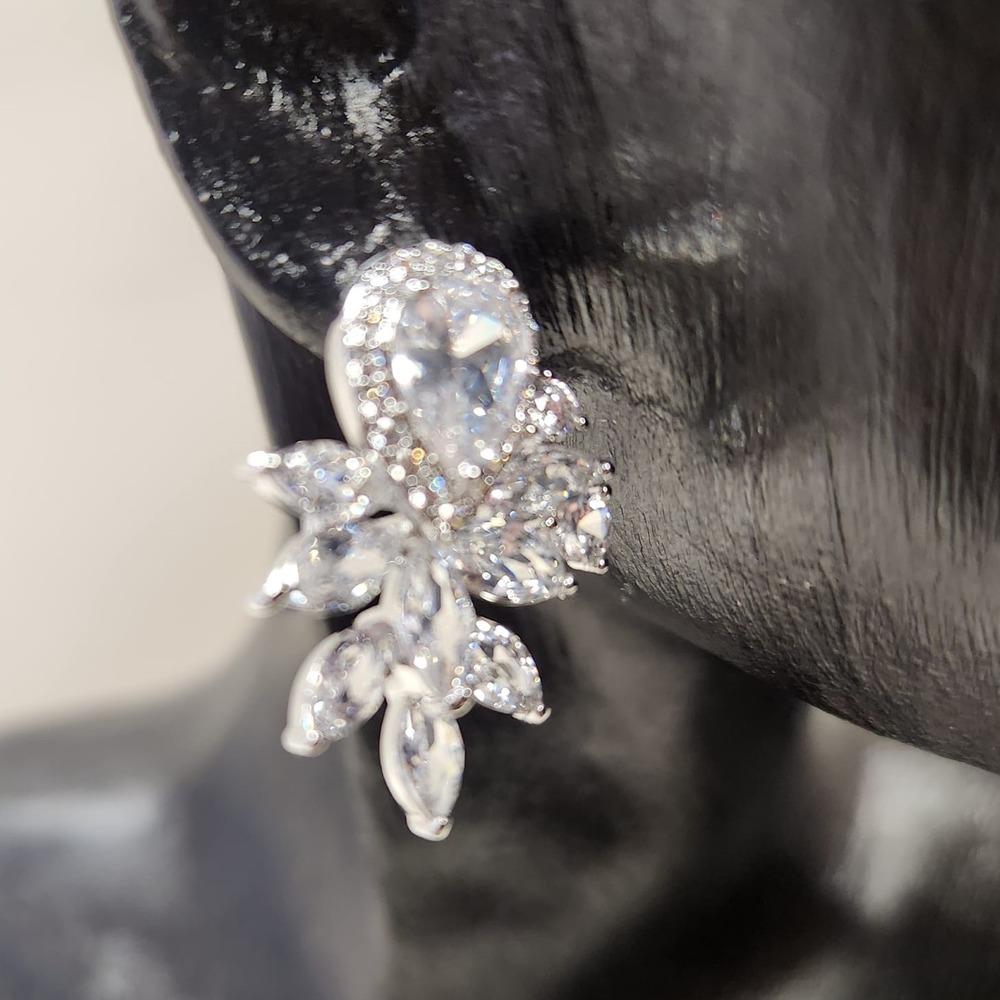 Detailed view of Sparkly stud earrings with clear stones