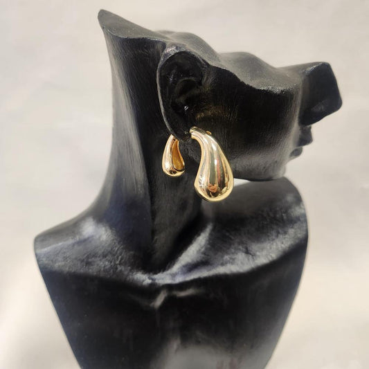 Modern dual tear drop earrings in gold color