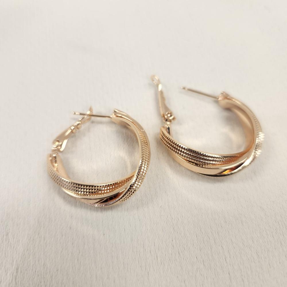 Lever back post of Rose gold twined and textured hoop earrings