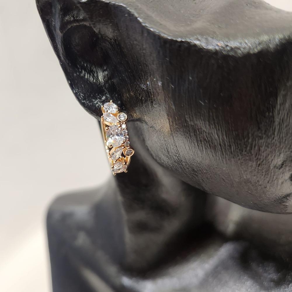 Detailed front view of Small hoop earrings with multi cut stones