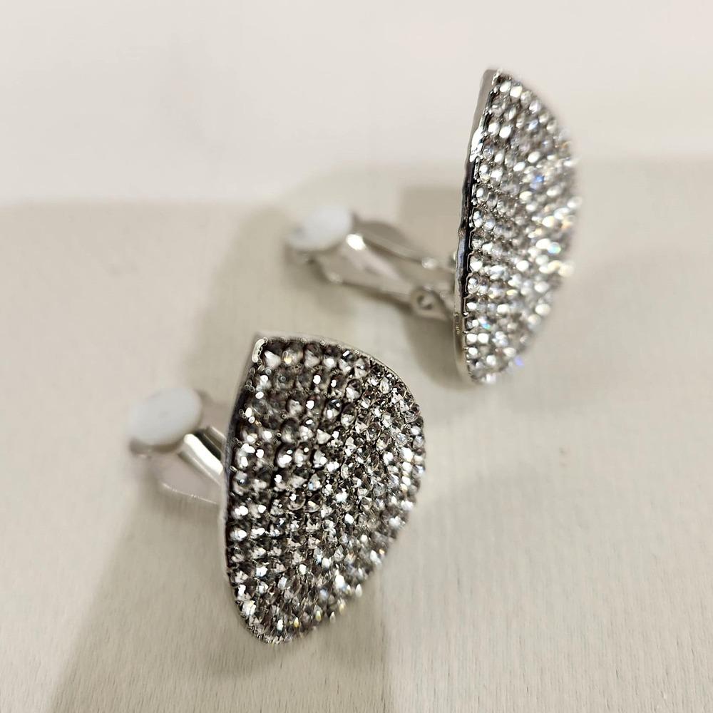 Another view of clip on earrings in silver colored frame