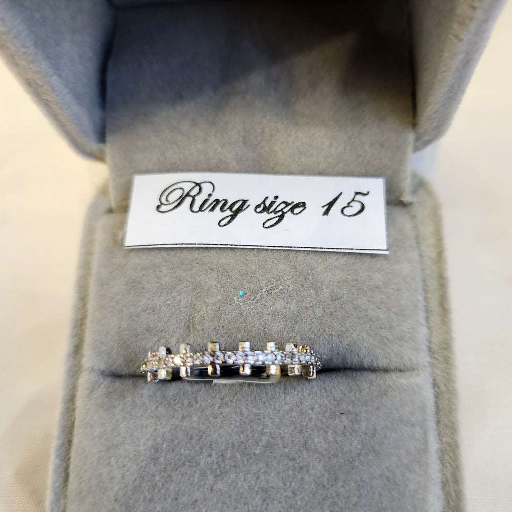 Detailed view of Delicate silver colored stone studded ring