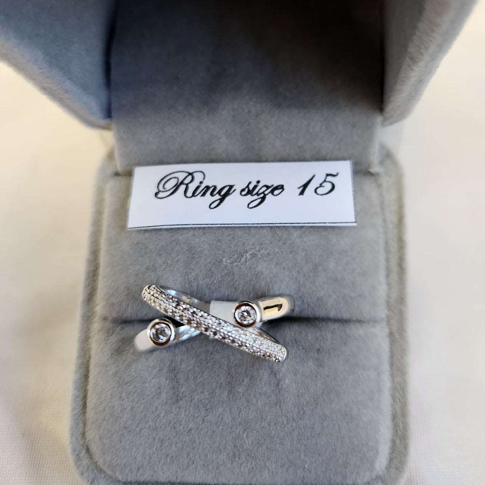 Detailed view of angled multi strand stone studded ring