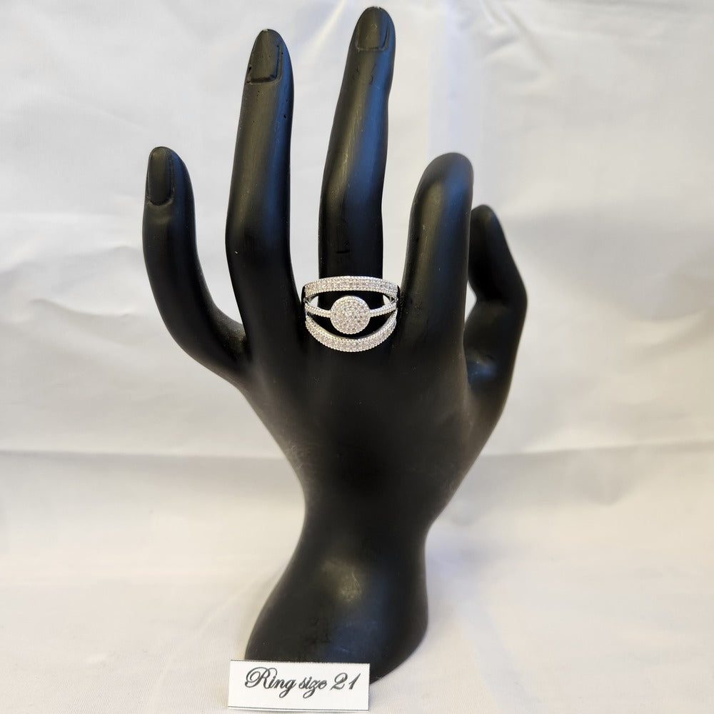 Multi strand ring with fine stone setting on a mannequin stand