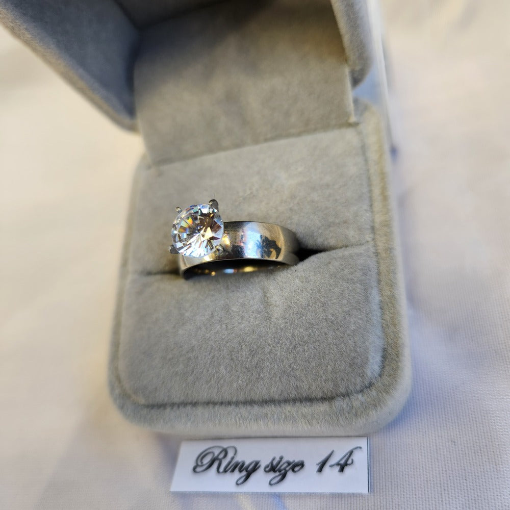 Detailed view of Ring in silver color with dazzling prong set stone